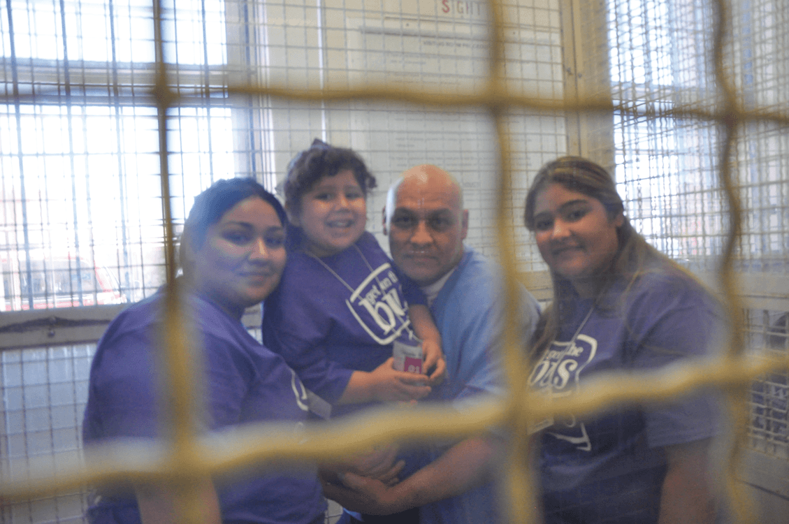 Inmate Christopher Jasso and Family at Get On The Bus, San Quentin State Prison, July 2017.