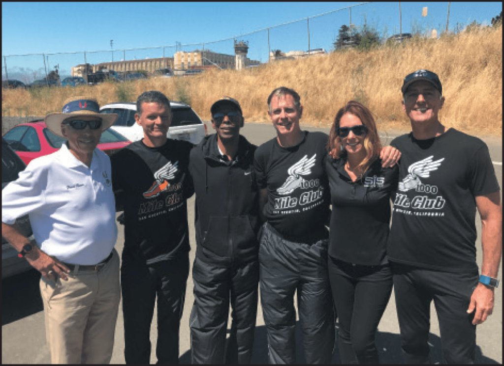 Frank Ruona, Kevin Rumon, Eddie Hart, Mark Stevens, Science In Sport’s Tonya Wearner and Jim Maloney outside San Quentin State Prison