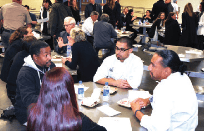 Eddie-Landeros-(center)-and-Julio-Saca-(left)-speaking-with-potential-employers