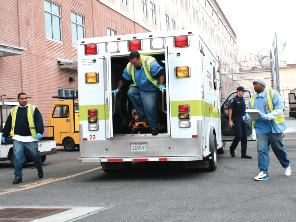 Pedro Cruz David Clifford Captain Spencer and Rolon Morris are on the job in front of SQ medical center.