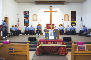 Friends paying tribute to the late Mr. Bowman in the SQ Protestant Chapel