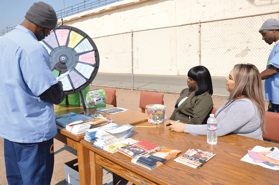 Participants spinning the wheel about the facts of STDs