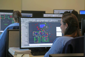A female offender learns job skills at one of two new tech facilities