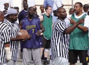 Montrell Vines (#7) looks as Mark Jackson cries foul in 2012
