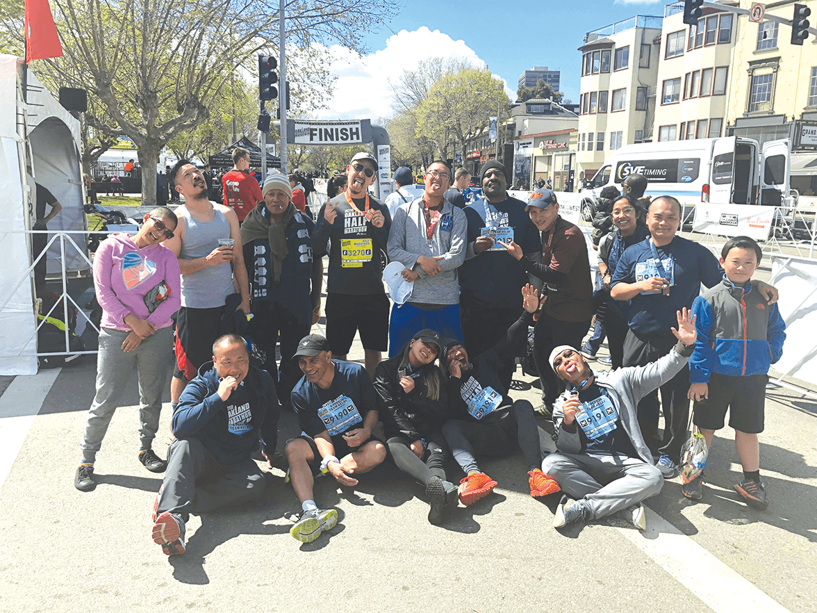 ROOTS’ members at the finish line at the Oakland Run Festival