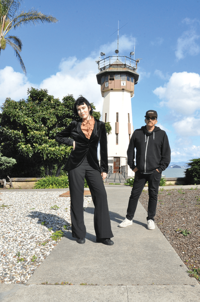 Queeny King and DJ Kraig in front of San Quentin