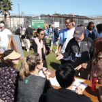 Volunteers exchanging views on the self-help programs offered at SQ