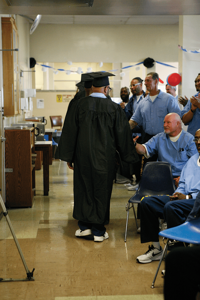 Inmates graduating from the Prison University Project in San Quentin