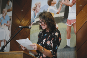 Dr. Amy Jamgochian reads how the graduates described themselves