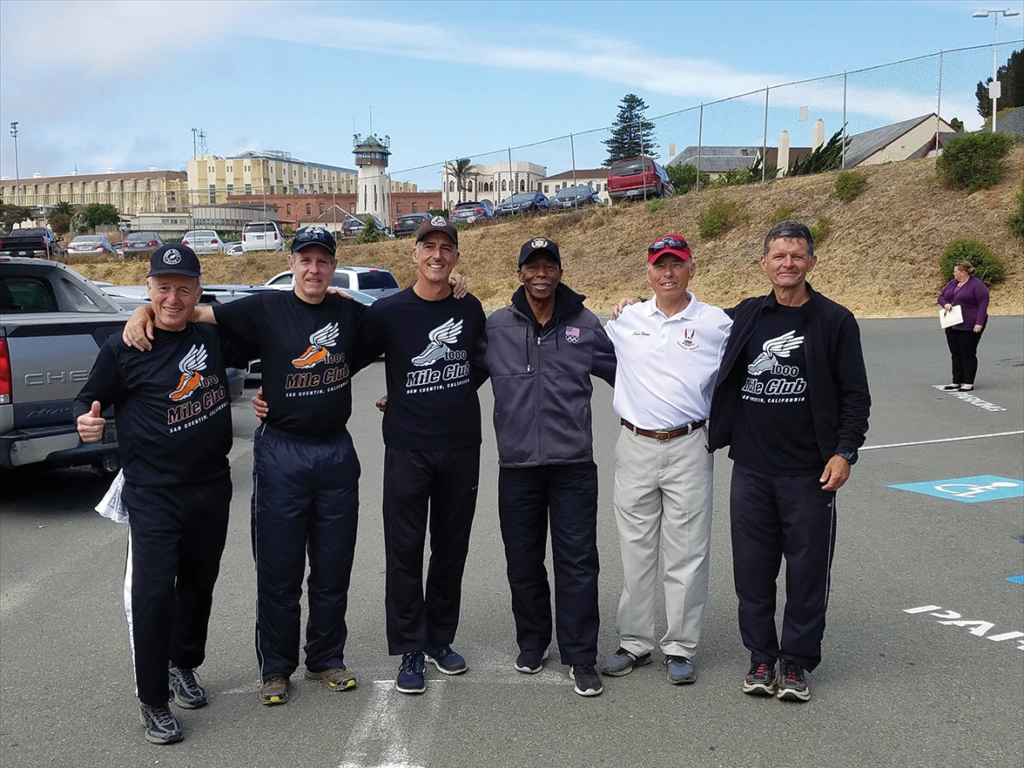 Eddie Hart (gray jacket) with 1000 Mile Club coaches Mark Stevens, Jim Maloney, Frank Ruona and Kevin Rumon.