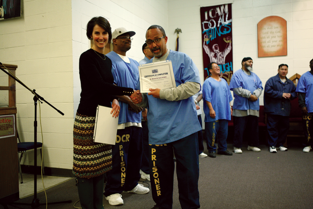Michael W. Davis getting his certificate