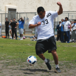 Carlos Ramirez playing soccer on the Lower Yard