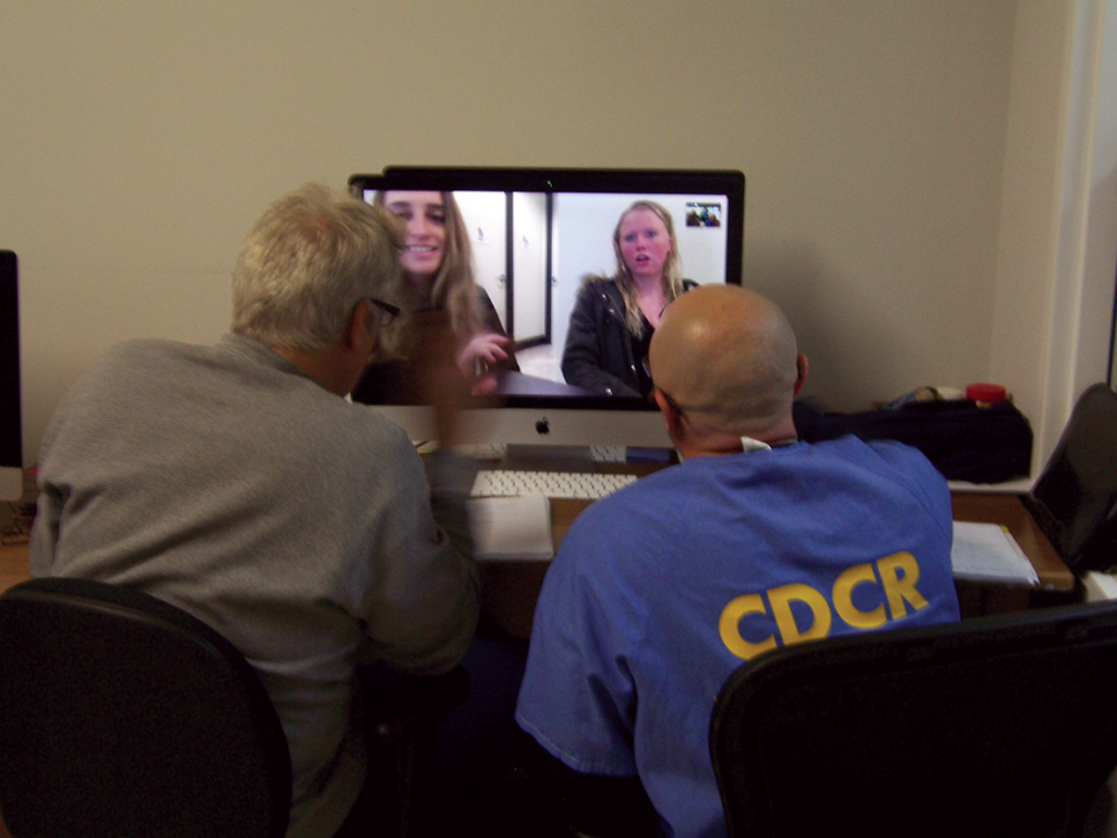TLM students Robert Barnes and Niccola Bucci zooming with Sarah Kimball Stebbins (left) and Yael Yahya
