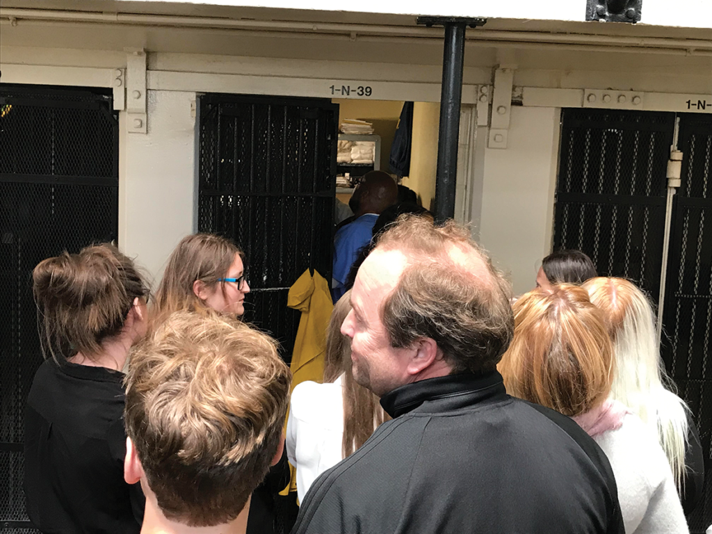 Derby students reading SQ News