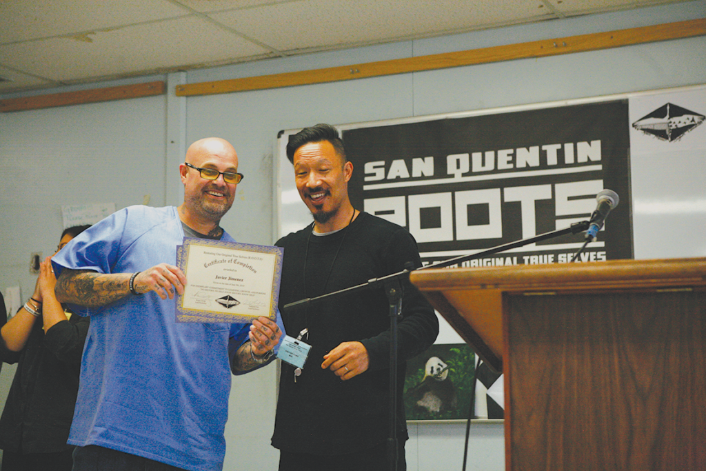 Roots graduate Javier Jimenez and Roger Chung