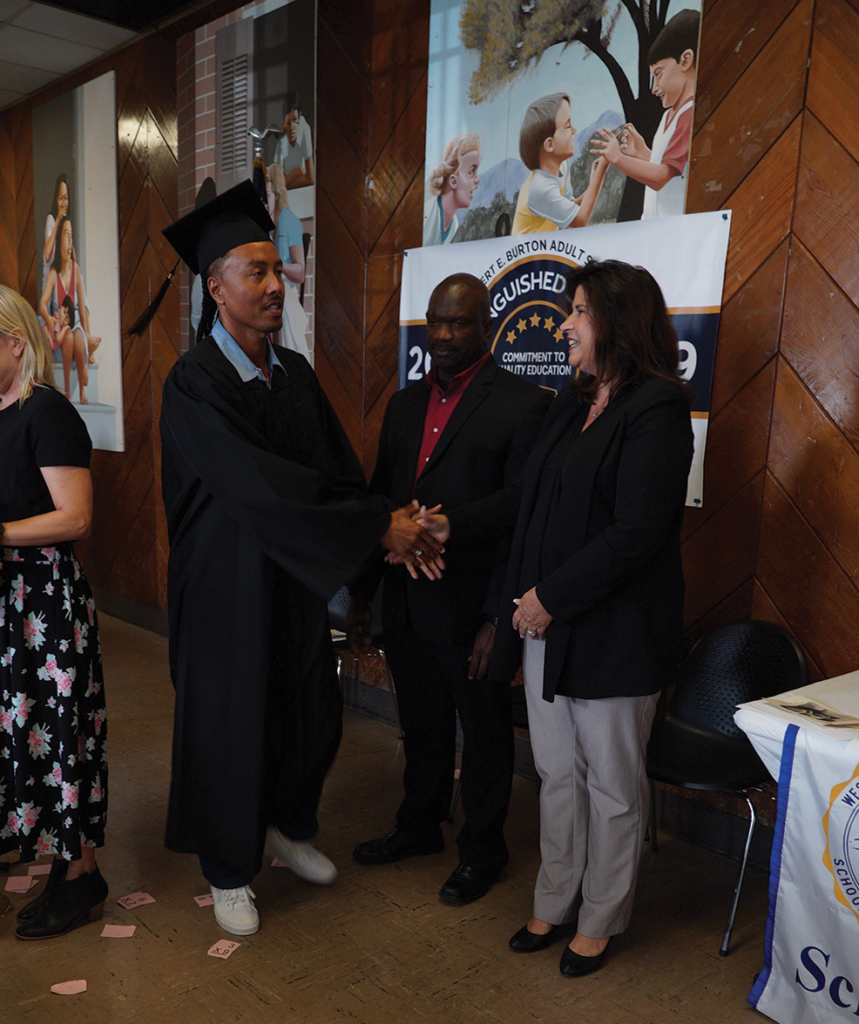 Adamu Chan, Correctional Counselor III Ian Palmer, and Associate Superintendent for the Northern Region, Jennifer Winistorfer (Office of Correctional Education)