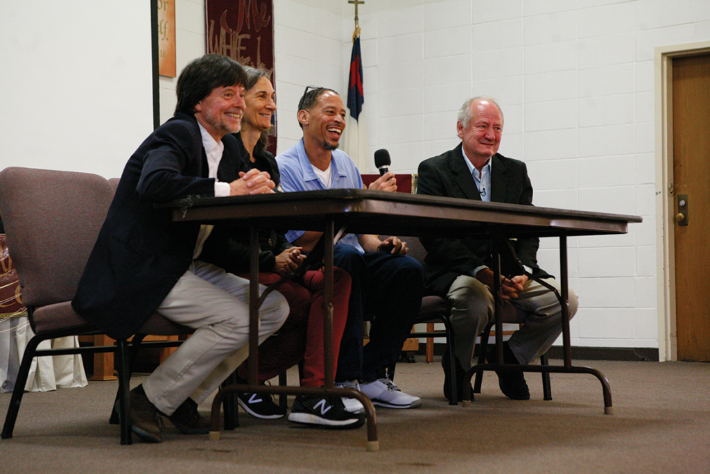 Burns, Dunfey, Moderator Rahsaan Thomas and Duncan on stage