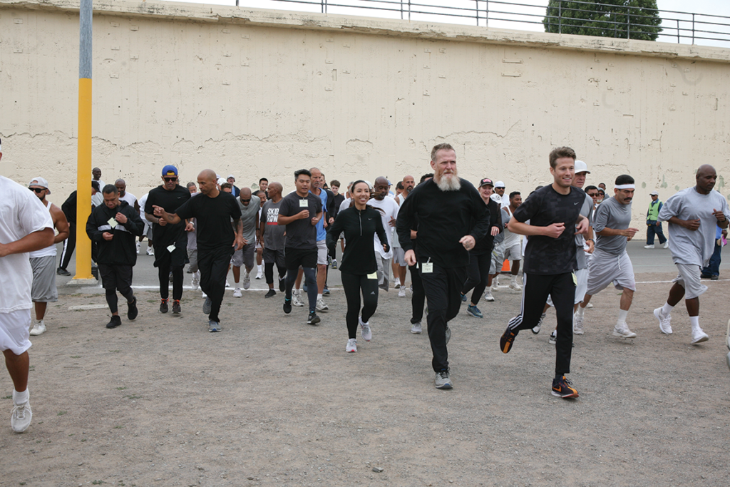 Skid Row and 1000 Mile Club runners at the start of the race
