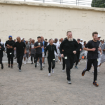 Skid Row and 1000 Mile Club runners at the start of the race