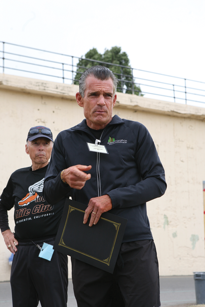 Judge Craig Mitchell with Coach Frank Ruona (back)