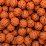 3d rendering of many orange basketball balls lying in an endless pile seen from the top.