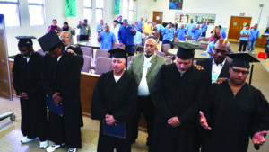 School of Theology graduates seven residents