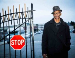 Watani "the OG" Stiner posing for a final time at the San Quentin East gate before Live Law event.