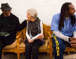 Watani Stiner with Kathleen Jackson and Lawence Pela waiting to speak at Live Law event.