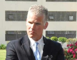 Former secretary of CDCR Matthew Cate standing in San Quentin’s Central Plaza during a Demo Day event