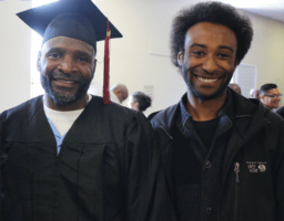 Graduate Isiah Caldwell commemorates his achievement with PUP instructor Nathan Moore Graduate Isiah Caldwell commemorates his achievement with PUP instructor Nathan Moore