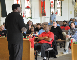 Dr. Harry Edwards speaking at a Roundtable event at San
Quentin with Forty-Niners in the audience including Eric Reid Dr. Harry Edwards speaking at a Roundtable event at San Quentin with Forty-Niners in the audience including Eric Reid