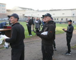 Coaches Kevin Rumon and Jim Maloney counting laps in the rain Coaches Kevin Rumon and Jim Maloney counting laps in the rain