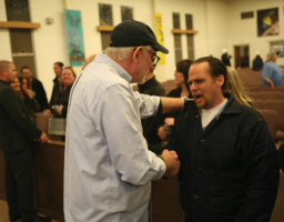 Goff speaking with a participant after the event Goff speaking with a participant after the event