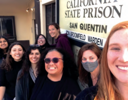 Members of ALIGHT Justice gather at the San Quentin entrance. ALIGHT was established to bring the Queer community together with non-Queer persons in the prison environment.