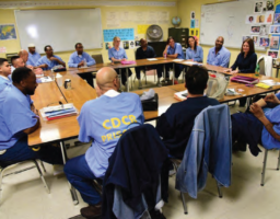 The ACT group, shown here in 2019 before the coronavirus pandemic, brings LGBTQ+ prisoners together with other members of the prison population in an effort to build empathy and undestanding between seemingly-disparate groups.