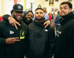 players gather in the Garden Chapel for a symposium on social justice issues
