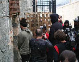 Players and team personnel tour San Quentin’s notorious dungeon.