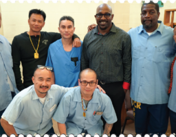 formerly incarcerated Sak Uppassay in black shirt at GRIP Graduation 2023